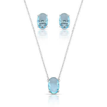 Conjunto oval com zircônia na cor topázio e banho de ródio branco