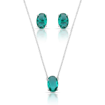 Conjunto oval com zircônia na cor turmalina e banho de ródio branco