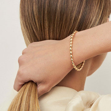 Pulseira gomos com banho de ouro 18k