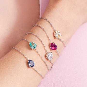 Pulseira prata 925 com gota zircônia na cor turmalina rosa e banho de ródio branco