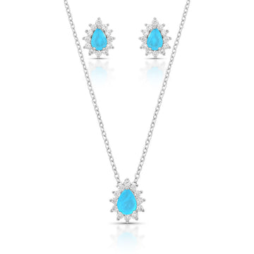 Conjunto gota princess com zircônia na cor água marina com banho de ródio branco