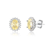 Brinco oval citrino entorno cravejado com banho de ródio branco