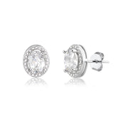 Brinco oval menor com zircônia cristal entorno cravejado com banho de ródio branco