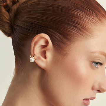 Piercing envolvente com perola e banho de ouro 18k