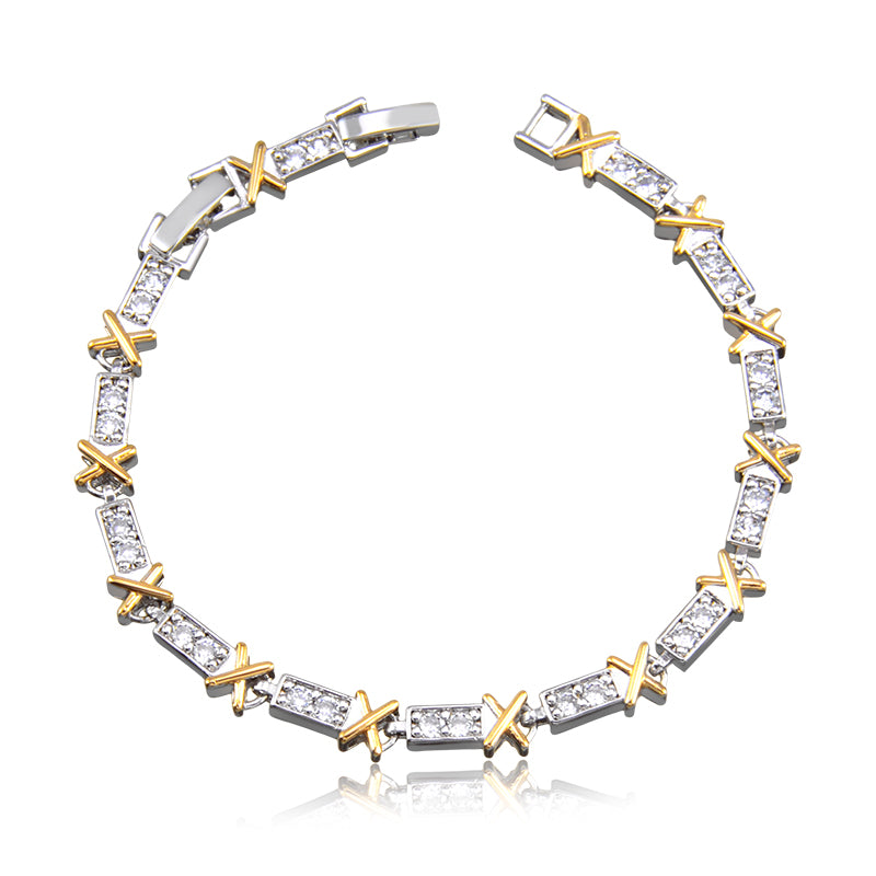 Pulseira riviera com detalhe em x dourado o banho de ródio branco