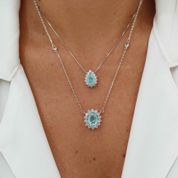 Colar oval água marinha entorno cravejado com banho de ródio branco