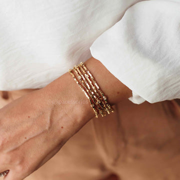 Pulseira 5 canutilhos dourado