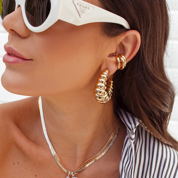 Piercing  tubo triplo crescente com banho de ouro 18k