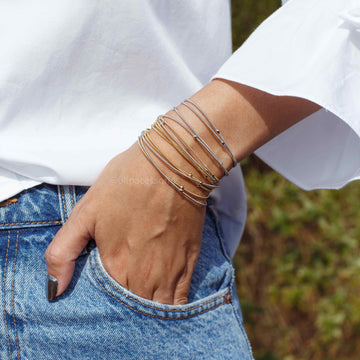 Pulseira ou Colar estilo corda de violão esferas com fecho de imã com banho de ouro 18k