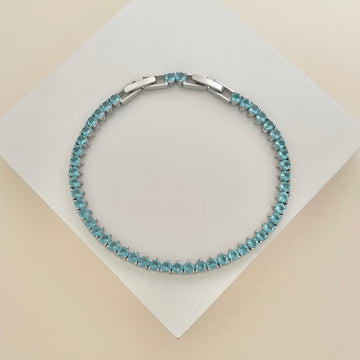 Pulseira riviera 3 garras com zircônia azul topázio em ródio branco