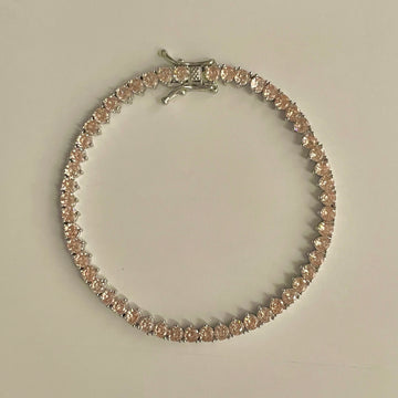 Pulseira riviera 3 garras com zircônia champanhe com banho de ródio branco