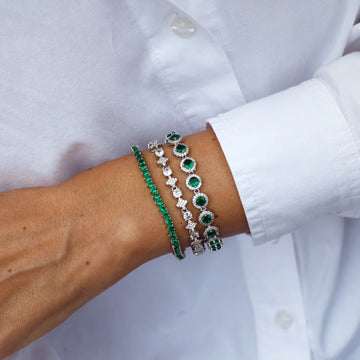 Pulseira riviera ovais esmeralda entorno cravejado com banho de ródio branco
