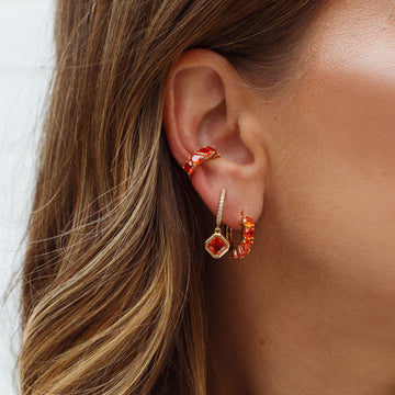 Piercing fake zircônia aperol com banho de ouro 18k