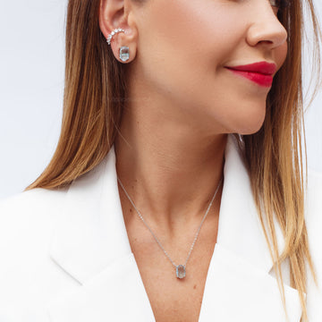 Conjunto oval com zircônia na cor topázio e banho de ródio branco