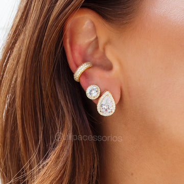 Brinco oval cristal entorno cravejado com banho de ouro 18k