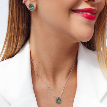 Conjunto oval com zircônia na cor turmalina e banho de ródio branco