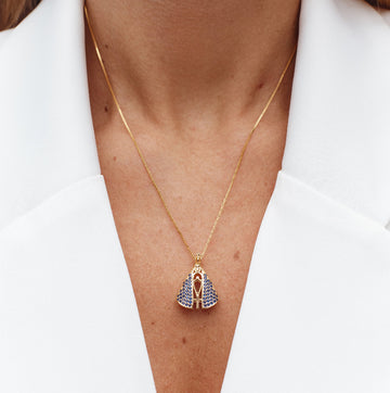 Colar nossa senhora dupla face com zircônias cristal e azul banho de ouro 18k
