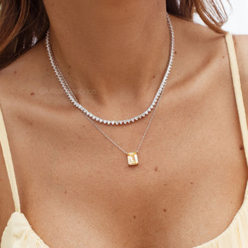 Colar Riviera prata 925 com zircônia cristal em formato de coração, trama rigida e banho de ródio branco, 40cm de comprimento e 3mm de espessura