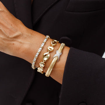 Pulseira trama com X cravejado com banho de ouro 18k