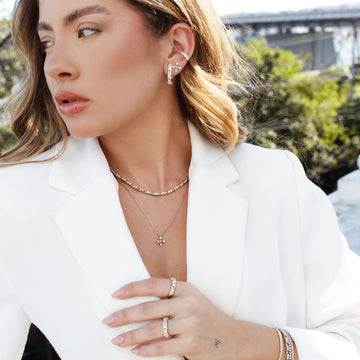 Anel prata 925 riviera Celina detalhe X dourado