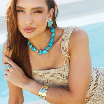 Anel oval turquesa com banho de ouro 18k