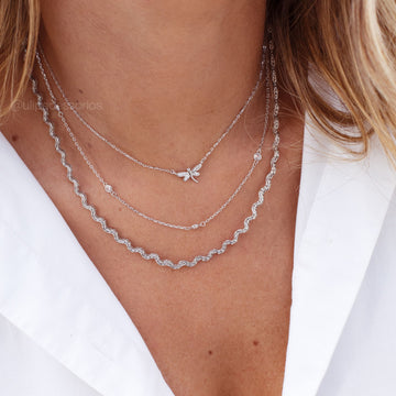 Colar trançado estilo ondas com banho de ródio branco