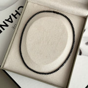 Colar riviera 3 garras preta trama rígida com zircônia negra de 3mm em ródio negro 42cm