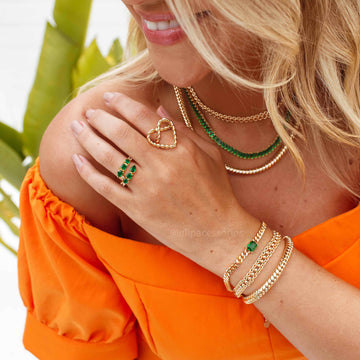 Pulseira tubo entrelaçado dourado