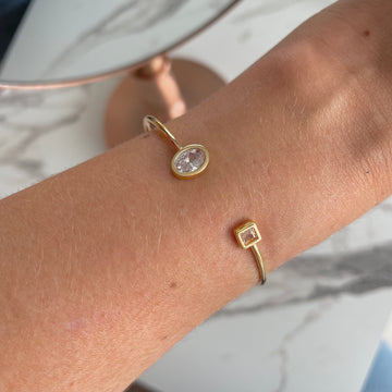Pulseira bracelete aberto oval e quadrado cristal dourado